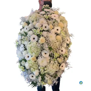 almohadón flores blancas
